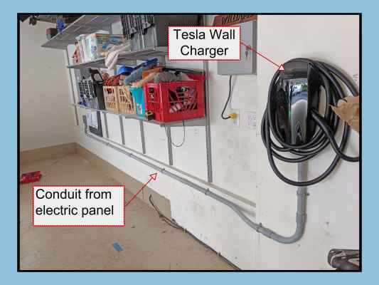 Tesla Wall Charger. Electrician ran the wiring like this. 6AWG with a 10AWG  ground. Shouldn't this be in conduit? : r/evcharging